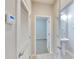 Clean hallway with access to bedroom and bathroom at 442 Bahama Grande Blvd, Apollo Beach, FL 33572