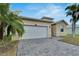 House exterior with driveway and landscaping at 442 Bahama Grande Blvd, Apollo Beach, FL 33572