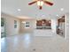 Open concept kitchen with breakfast bar and tiled flooring at 442 Bahama Grande Blvd, Apollo Beach, FL 33572