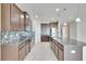 Modern kitchen with granite countertops and stainless steel appliances at 442 Bahama Grande Blvd, Apollo Beach, FL 33572