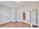 Spacious office with wood-look tile flooring and natural light at 442 Bahama Grande Blvd, Apollo Beach, FL 33572