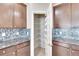 Walk-in pantry with ample shelving for storage at 442 Bahama Grande Blvd, Apollo Beach, FL 33572