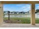 Covered patio with view of canal and neighborhood at 442 Bahama Grande Blvd, Apollo Beach, FL 33572