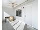 Florida room with ceiling fan, tiled floor, and access to the outdoors at 5316 Buttonwood Dr, New Port Richey, FL 34652