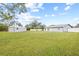 Spacious backyard with a detached shed, fenced perimeter, and plenty of green space at 6090 114Th N Ter, Pinellas Park, FL 33782