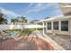 Spacious backyard patio with brick pavers and small pond with fountain at 6459 30Th N Ave, St Petersburg, FL 33710