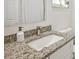 Modern bathroom with granite countertop, white sink, and contemporary faucet at 6459 30Th N Ave, St Petersburg, FL 33710
