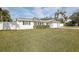 Charming single-story home with white siding and a well-manicured lawn at 6459 30Th N Ave, St Petersburg, FL 33710