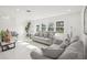 Open and airy living room with ample natural light and stylish furnishings at 6459 30Th N Ave, St Petersburg, FL 33710