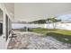 Covered patio with pavers and a view of the fenced backyard at 6459 30Th N Ave, St Petersburg, FL 33710