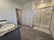 Modern bathroom featuring dual vanities and a glass shower enclosure at 8379 Ender Hills Dr, Wesley Chapel, FL 33545
