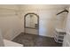 Spacious walk-in closet with wire shelving, mirror, and storage unit at 8379 Ender Hills Dr, Wesley Chapel, FL 33545