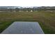 A community water view with homes in the background at 8379 Ender Hills Dr, Wesley Chapel, FL 33545