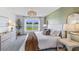 Inviting main bedroom with large windows and stylish furnishings at 10903 Gentle Current Way, Parrish, FL 34219