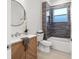 Modern bathroom with a bathtub and wood vanity at 1716 22Nd N Ave, St Petersburg, FL 33713