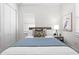 Bright bedroom with a comfortable bed and hardwood floors at 1716 22Nd N Ave, St Petersburg, FL 33713