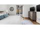 Main bedroom with a queen-size bed, dresser, and patio access at 1716 22Nd N Ave, St Petersburg, FL 33713