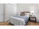 Simple bedroom with a double bed and nightstand at 1716 22Nd N Ave, St Petersburg, FL 33713