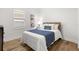 Bright bedroom with a double bed and wood flooring at 1716 22Nd N Ave, St Petersburg, FL 33713