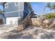 Home's exterior features a garage and wooden stairs at 1716 22Nd N Ave, St Petersburg, FL 33713