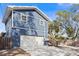 Two-story home with a detached garage and a wooden fence at 1716 22Nd N Ave, St Petersburg, FL 33713