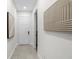 Bright hallway with modern art and tile floors at 1716 22Nd N Ave, St Petersburg, FL 33713