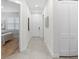 Bright hallway with tile floors and access to bedrooms at 1716 22Nd N Ave, St Petersburg, FL 33713