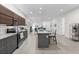 Open concept kitchen with island and stainless steel appliances at 1716 22Nd N Ave, St Petersburg, FL 33713