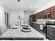 Modern kitchen with marble countertops and stainless steel appliances at 1716 22Nd N Ave, St Petersburg, FL 33713