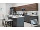 Modern kitchen featuring stainless steel appliances and a large island at 1716 22Nd N Ave, St Petersburg, FL 33713
