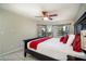 Spacious bedroom with a king-size bed and access to balcony at 1743 Golfview Dr # 1743, Tarpon Springs, FL 34689