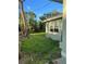 View of the backyard and a side of the house at 1787 Shore Acres Ne Blvd, St Petersburg, FL 33703