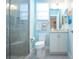 Clean bathroom with a walk-in shower and granite vanity at 1847 Pacific Dunes Dr, Sun City Center, FL 33573