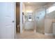Clean bathroom with a shower and white vanity at 1847 Pacific Dunes Dr, Sun City Center, FL 33573