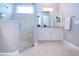 Bathroom with shower, vanity, and granite countertop at 1847 Pacific Dunes Dr, Sun City Center, FL 33573