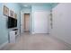 Light and airy bedroom with double closets and TV at 1847 Pacific Dunes Dr, Sun City Center, FL 33573