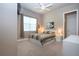 Well-lit bedroom with a comfy bed and nice window at 1847 Pacific Dunes Dr, Sun City Center, FL 33573
