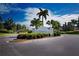 Verona community entrance with landscaping at 1847 Pacific Dunes Dr, Sun City Center, FL 33573