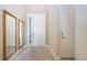 Entryway with mirrors and tiled floor at 1847 Pacific Dunes Dr, Sun City Center, FL 33573