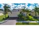 Attractive single-story home with a two-car garage and landscaping at 1847 Pacific Dunes Dr, Sun City Center, FL 33573