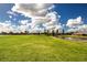 View of the community golf course and homes at 1847 Pacific Dunes Dr, Sun City Center, FL 33573