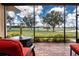 Stunning view from screened patio overlooking the golf course at 1847 Pacific Dunes Dr, Sun City Center, FL 33573