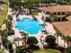Resort-style pool with surrounding lounge area at 1847 Pacific Dunes Dr, Sun City Center, FL 33573