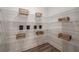 Well-organized pantry with ample shelving and storage space at 18472 Vista Park Ter, Venice, FL 34293