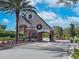 Gated community entrance with a festive holiday wreath at 18801 Chaville Rd, Lutz, FL 33558