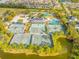 Aerial view of community tennis courts near clubhouse at 18801 Chaville Rd, Lutz, FL 33558