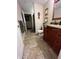 Primary bathroom with double vanity and toilet at 1910 E Palm Ave # 10303, Tampa, FL 33605