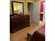 Spacious bedroom with large dresser and ensuite bathroom at 1910 E Palm Ave # 10303, Tampa, FL 33605