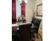 Elegant dining room with glass table and dark chairs at 1910 E Palm Ave # 10303, Tampa, FL 33605