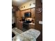 Modern kitchen with granite countertops and stainless steel appliances at 1910 E Palm Ave # 10303, Tampa, FL 33605